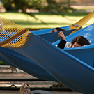 woman in a blue hammock