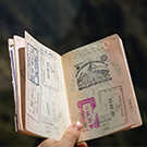 open passport with stamps