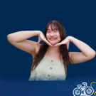 Global Aggies logo with Kiara smiling.